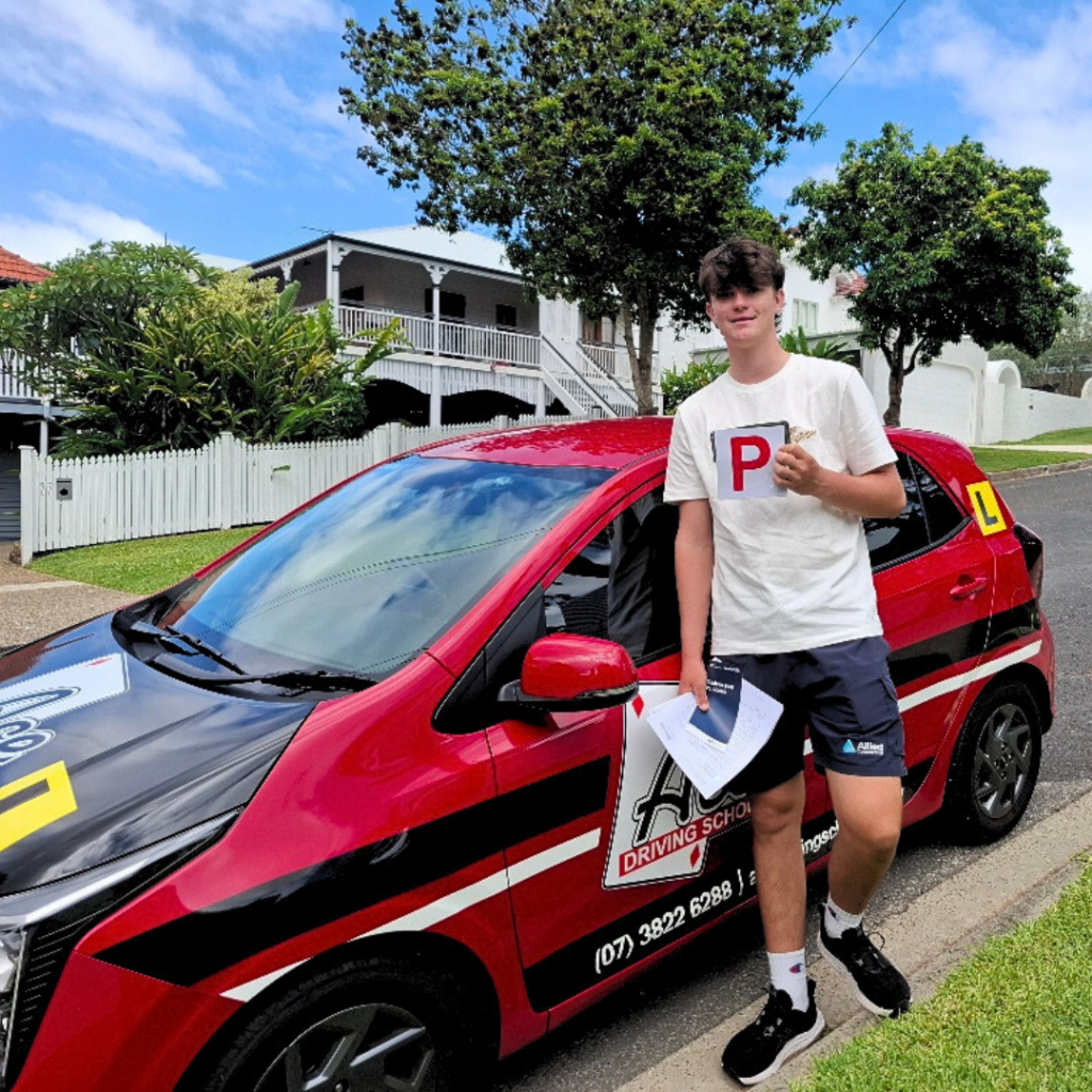 Ace Driving School student celebrating passing their practical driving test.